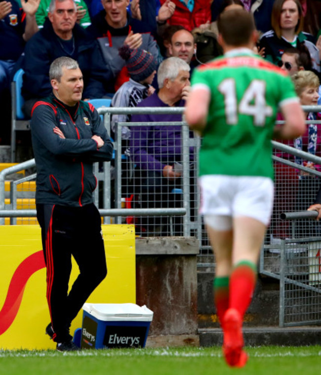 James Horan looks on as Andy Moran is replaced during the first half