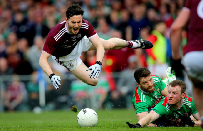 Ian Burke is fouled by Chris Barrett to win a penalty