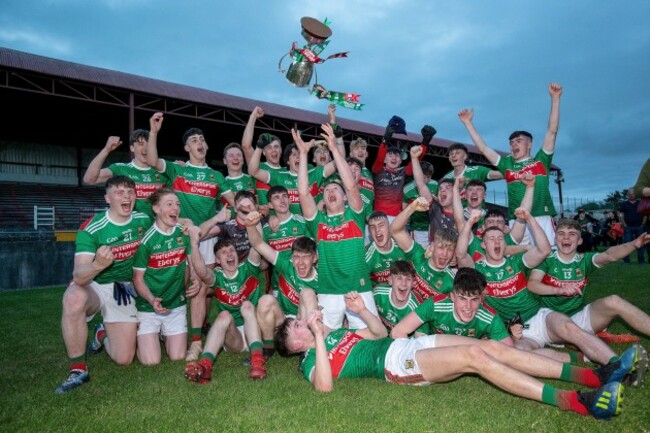Mayo players celebrate with the trophy