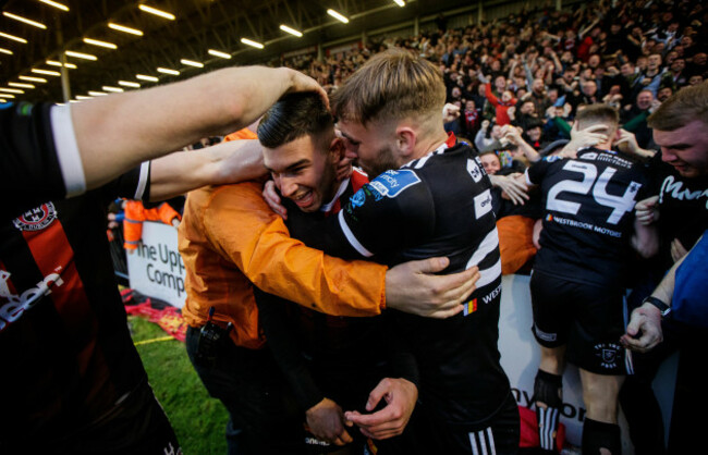 Daniel Mandroiu celebrates scoring with Luke Wade-Slater