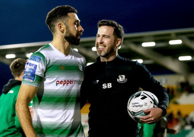 Stephen Bradley celebrates after the game with Roberto Lopes
