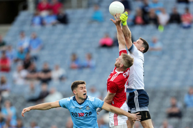 Ruairi Deane with David Byrne and Stephen Cluxton