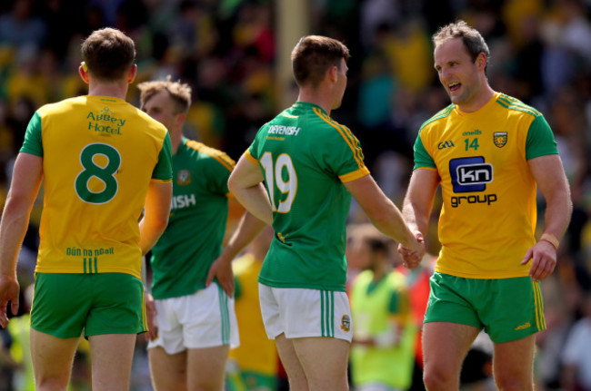 Michael Murphy shakes hands with Darragh Campion after the game