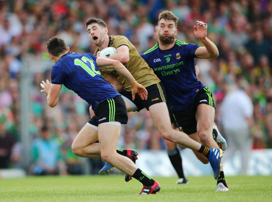 Jason Doherty and Aidan O’Shea with Paul Geaney