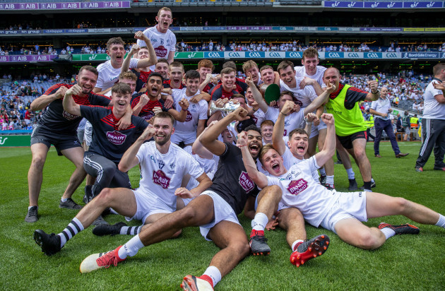 The Kildare team celebrate after the game