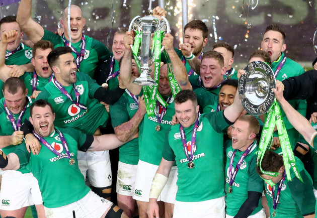 The Ireland team celebrate winning the grand slam