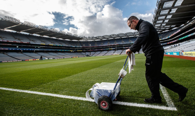 Enda Colfer paints the lines before the game