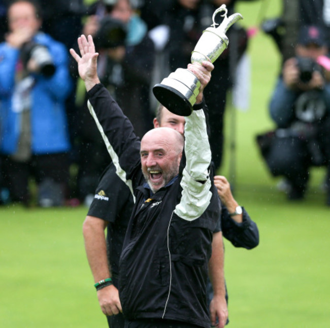 Shane Lowry's father Brendan celebrates with the Claret Jug