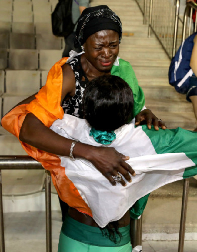 Rhasidat Adeleke celebrates winning with her mother Adewumi Ademola