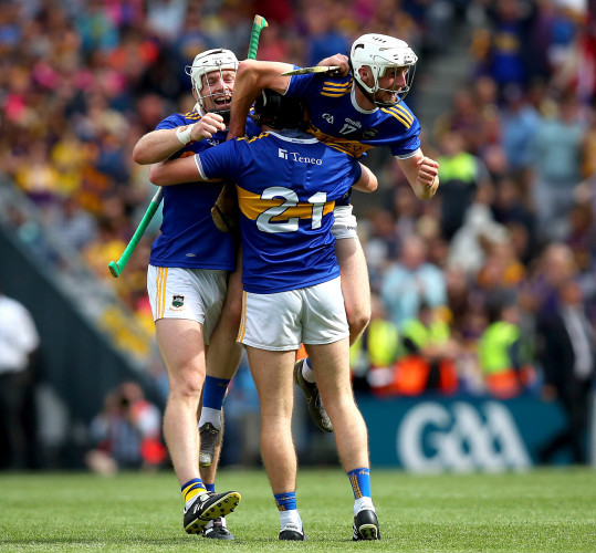 Padraic Maher, Alan Flynn and Ger Browne celebrate at the final whistle