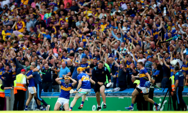 Seamus Callanan and Jake Morris celebrate at the final whistle