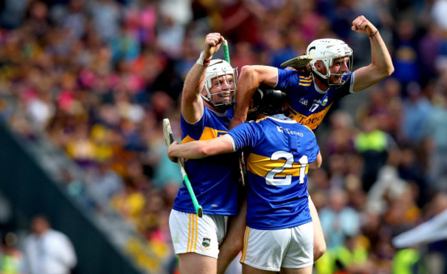 Padraic Maher, Alan Flynn and Ger Browne celebrate at the final whistle