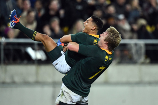 Herschel Jantjies celebrates scoring a try