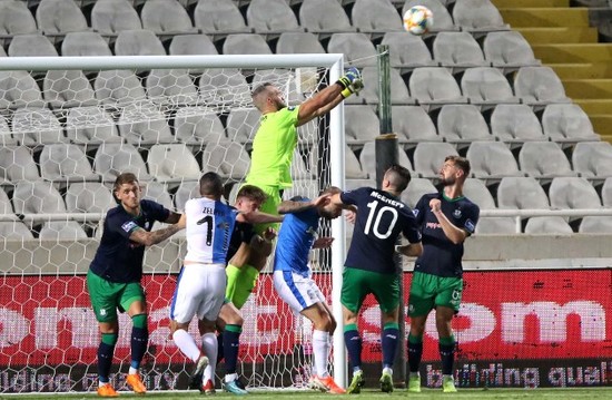 Alan Mannus punches clear