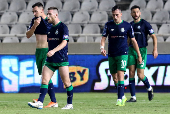 Aaron Greene, Jack Byrne and Aaron McEneff dejected after Apollon scored their second goal