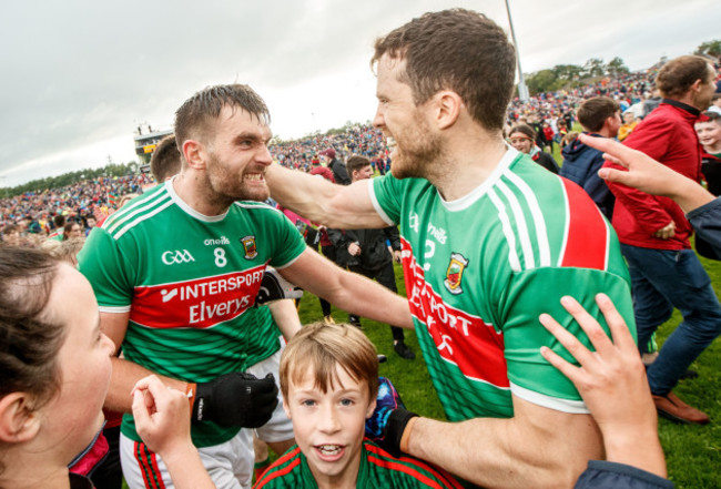 Aidan O'Shea and Chris Barrett celebrate after the game