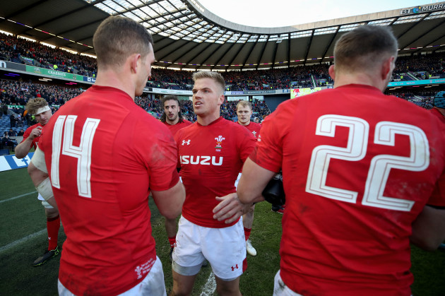 George North and Gareth Anscombe celebrate after the game