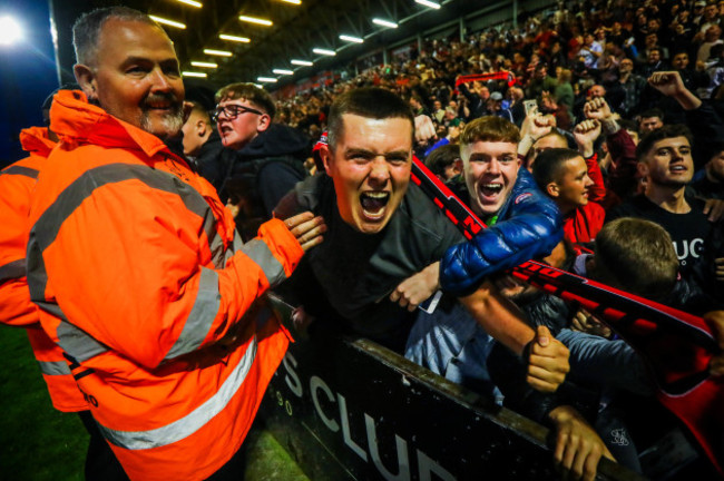 A Bohs' fan celebrates his side's third goal