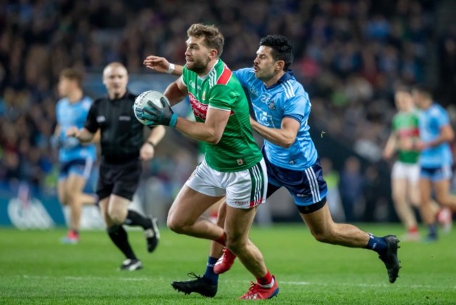 Cian O'Sullivan tackles Aidan O'Shea during their 2019 league meeting.