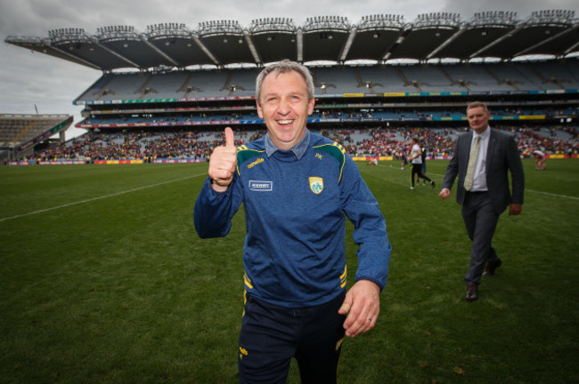 Peter Keane celebrates after the game