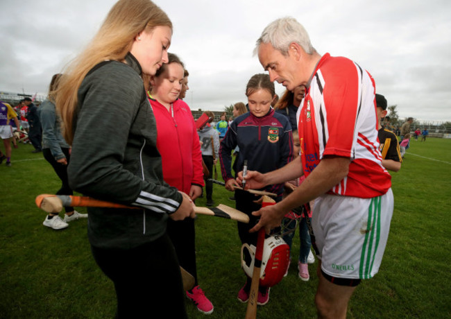 Ruby Walsh signs autographs for fans after the game