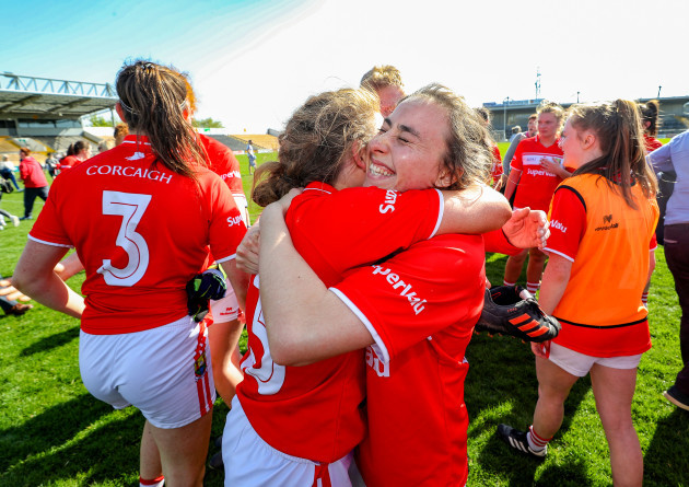 Libbby Coppinger and Melissa Duggan celebrate after the game