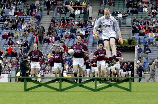 general-view-of-the-westmeath-team-as-goalkeeper-gary-connaughton-jumps-over-the-team-bench