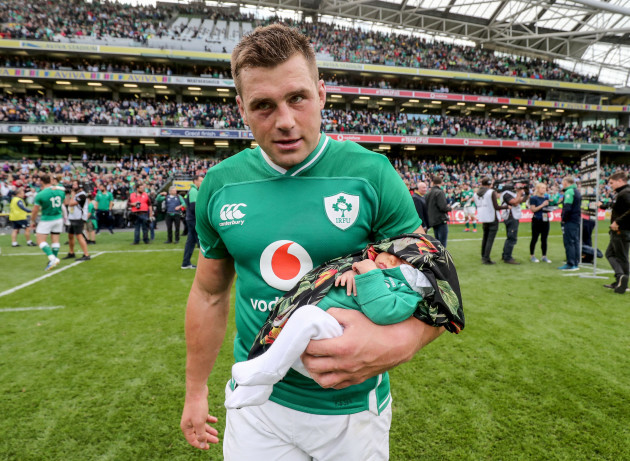 cj-stander-with-his-daughter-everli-after-the-game