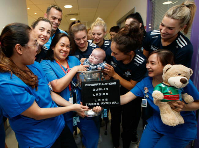 james-ryan-with-hannah-oneill-and-teammates