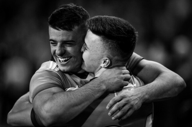 brian-howard-celebrates-after-the-game-with-eoin-murchan