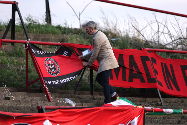 a-bohemians-fan-hangs-a-banner-ahead-of-the-game