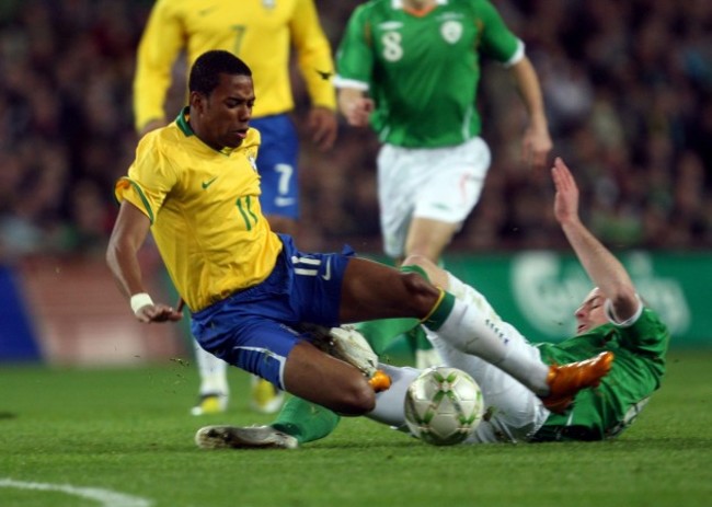 robinho-of-brazil-tackled-by-lee-carsley-of-ireland