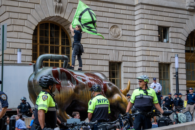 nyc-activists-covered-wall-street-bull-in-blood