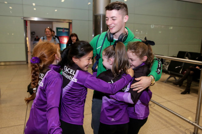 rhys-mcclenaghan-is-greeted-by-members-of-excel-gymnastics