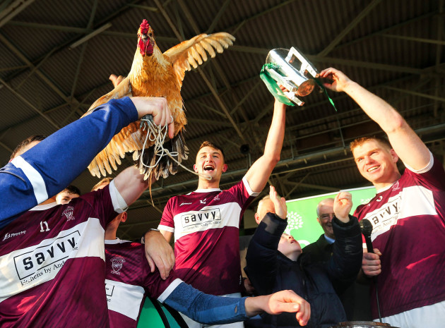 borris-ileighs-mascot-joins-the-celebrations-as-conor-kenny-and-sean-mccormack-lift-the-cup