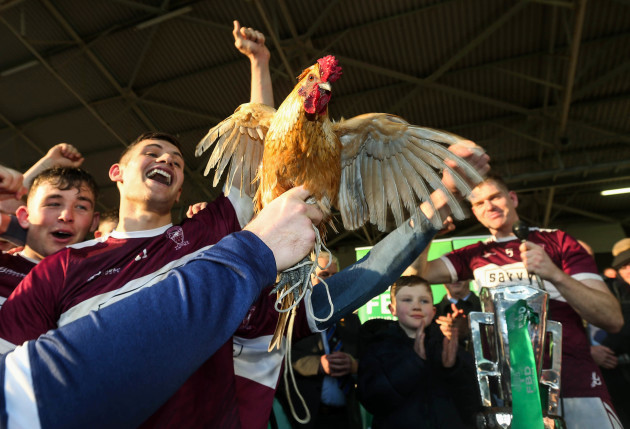 borris-ileighs-mascot-joins-the-celebrations-as-conor-kenny-and-sean-mccormack-lift-the-cup