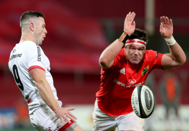 billy-holland-attempts-to-block-a-kick-by-john-cooney