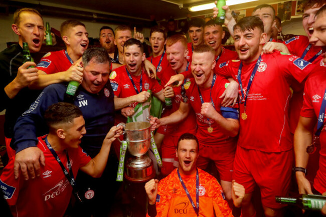 shels-celebrate-in-the-dressing-room-with-the-trophy-after-wining-the-league
