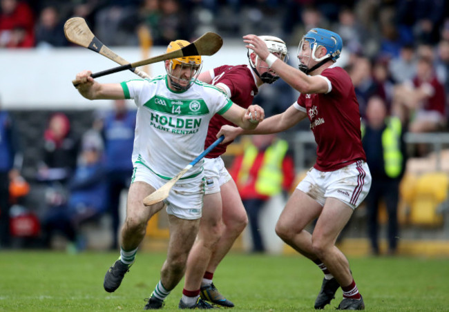 colin-fennelly-is-tackled-by-aaron-maddock-and-conor-firman