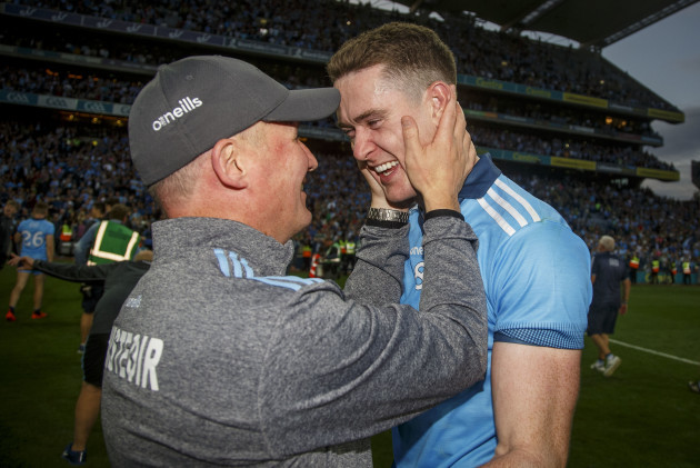 brian-fenton-celebrates-with-manager-jim-gavin-after-the-game