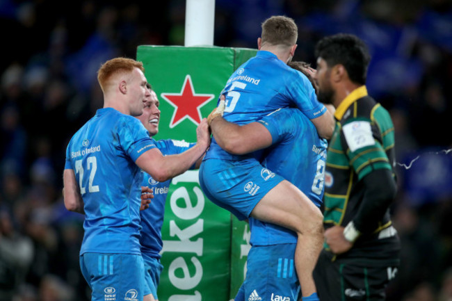 caelan-doris-celebrates-scoring-a-try-with-ciaran-frawley-jordan-larmour-and-bryan-byrne