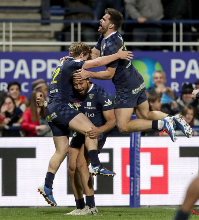 jake-mcintyre-celebrates-scoring-a-try-with-george-moala-an-damian-penaud