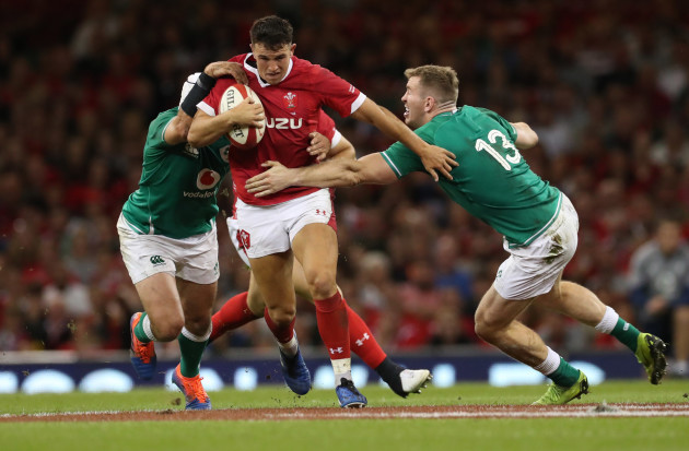 wales-owen-watkin-is-tackled-by-irelands-rory-best-and-chris-farrell
