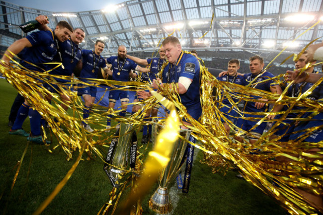 tadhg-furlong-celebrates-with-the-pro14-and-champions-cup-trophies