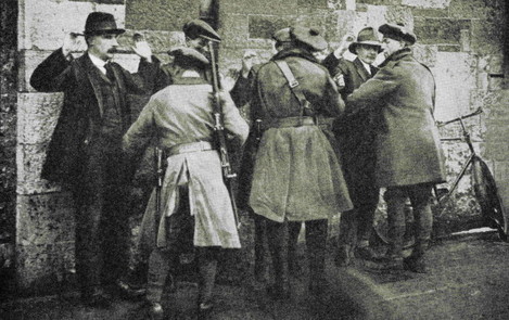 suspects-being-searched-in-dublin-ireland-in-1920-during-the-irish-war-of-independence-aka-anglo-irish-war-from-story-of-twenty-five-years-published-1935