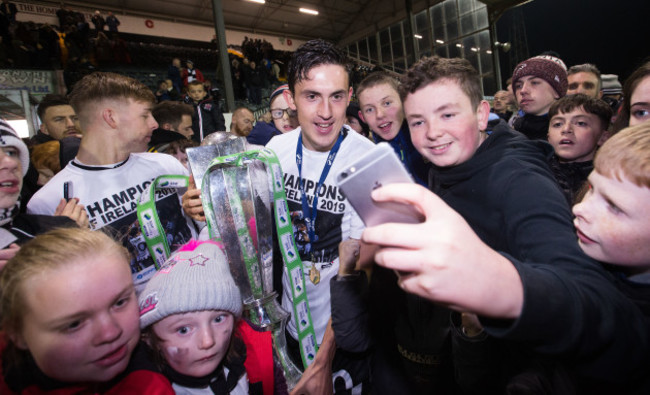 jamie-mcgrath-celebrates-after-the-game-with-fans