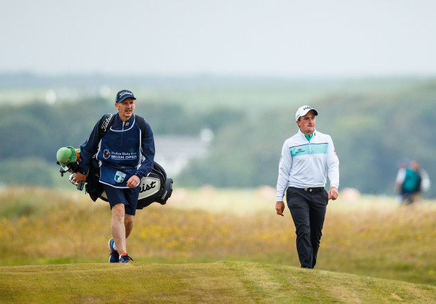 paul-dunne-makes-his-way-up-the-12th-hole