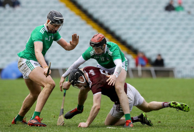 gearoid-hegarty-and-david-dempsey-tackle-padraic-mannion