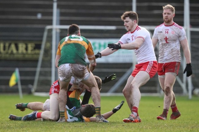 ben-mcdonnell-and-david-clifford-scuffle-on-the-ground