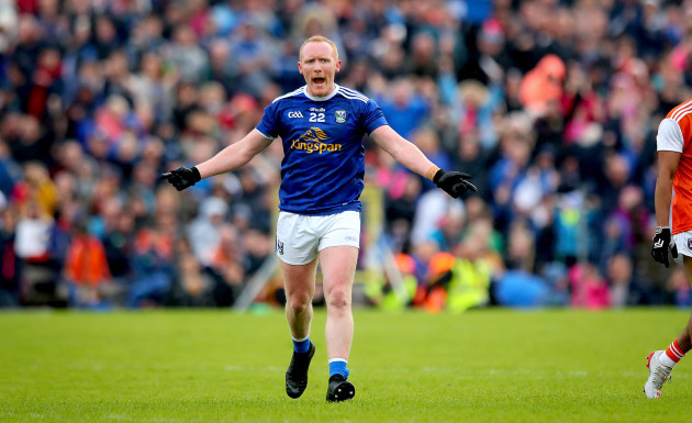 cian-mackey-celebrates-scoring-a-point-in-extra-time-to-force-a-replay